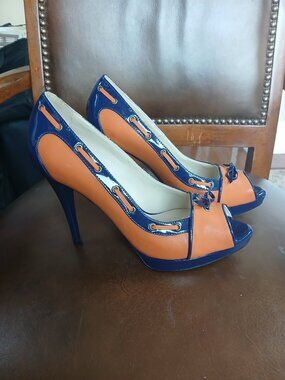 Vibrant new and unworn patent leather heels.